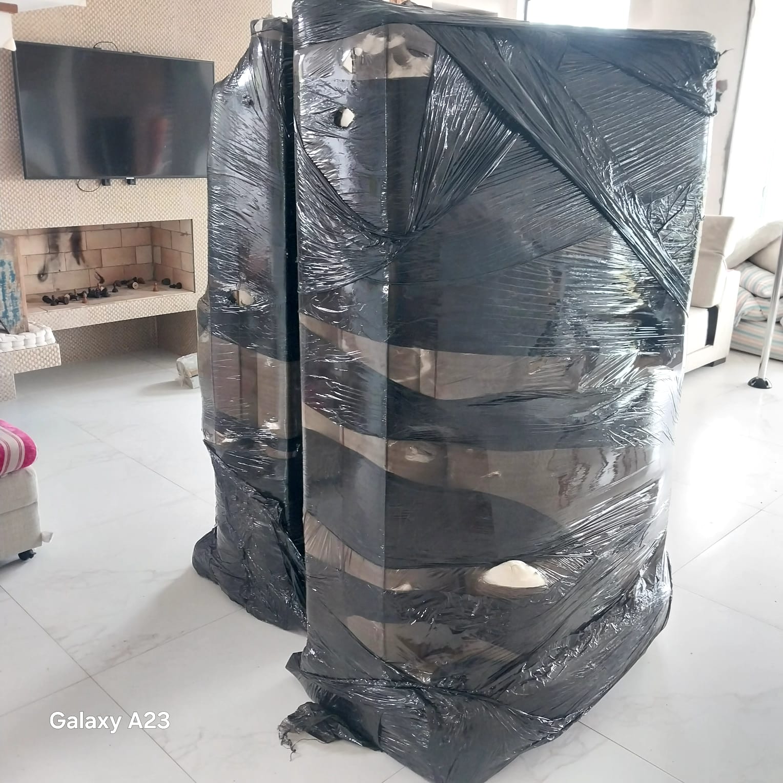 Camisetas da ConfiariLog embaladas